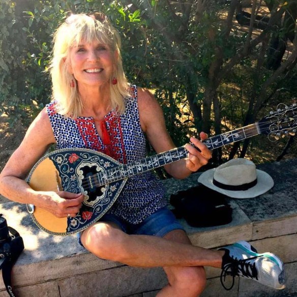 Casey playing the bouzouki
